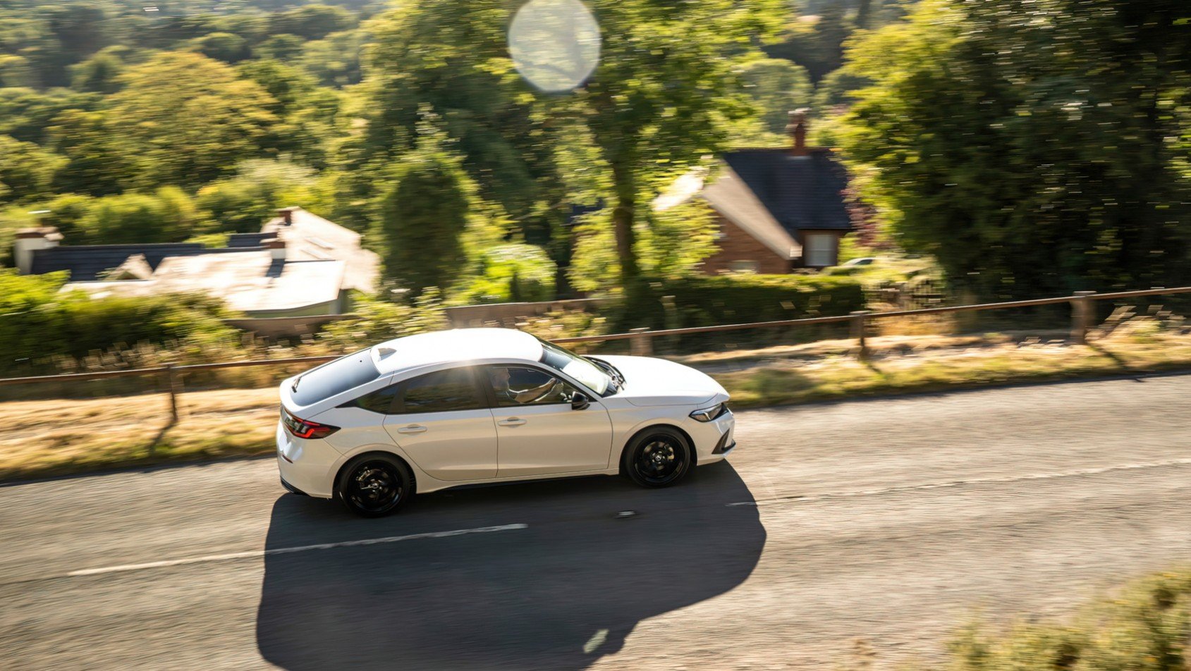 Honda Civic e:HEV Sport  Honda Civic e:HEV Sport podczas jazdy