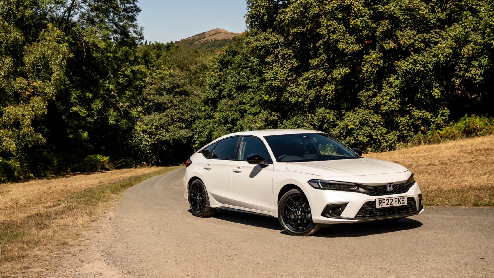 Honda Civic e:HEV Sport Honda Civic e:HEV Sport za zakrętem
