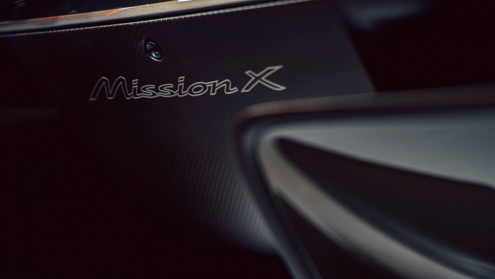 Porsche Mission X logo mission x